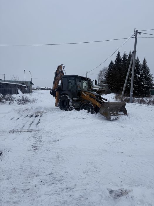 Услуги эксоватор погрузчик