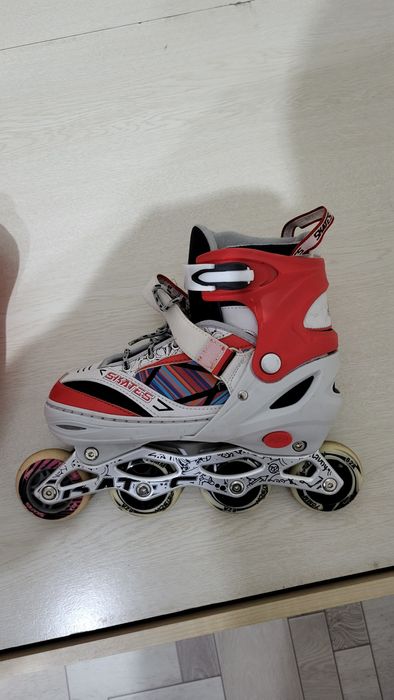 Роликовые коньки