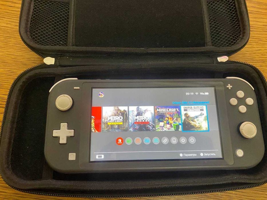 Nintendo switch lite чипованая с играми.