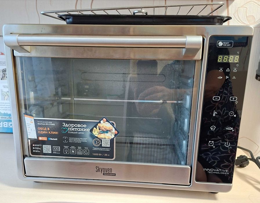 Продам электрическую печь Redmond SkyOven