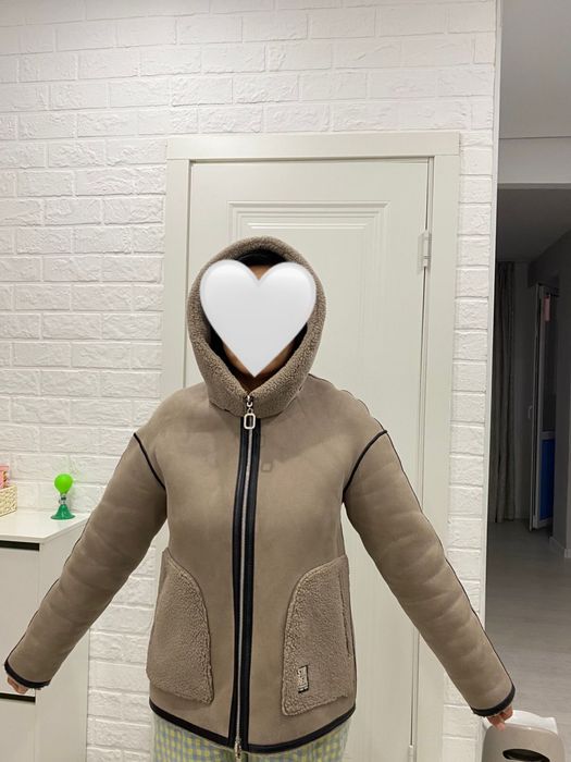 Дубленка укороченная 48-50размерге келеді.