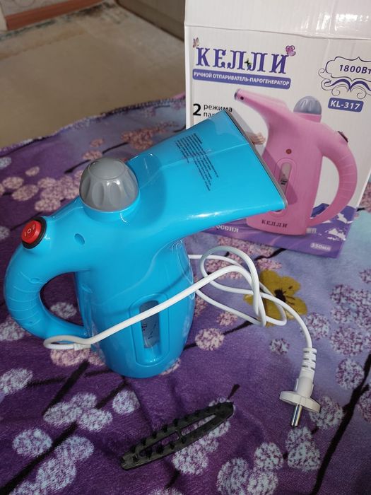 Новый ручной отпариватель