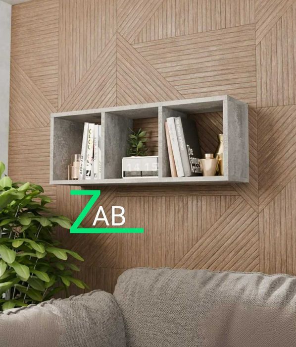 Навесная книжная полка удачное решение для гостиной и под телевизор.