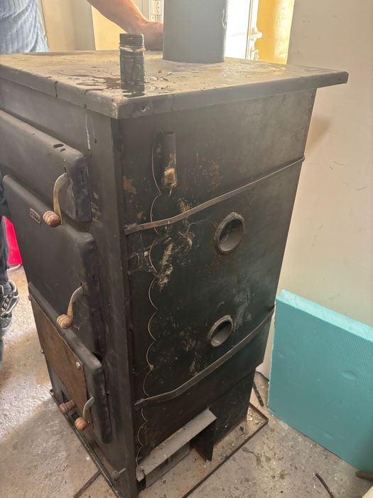 Продавам отоплителен котел на пелети и дърва