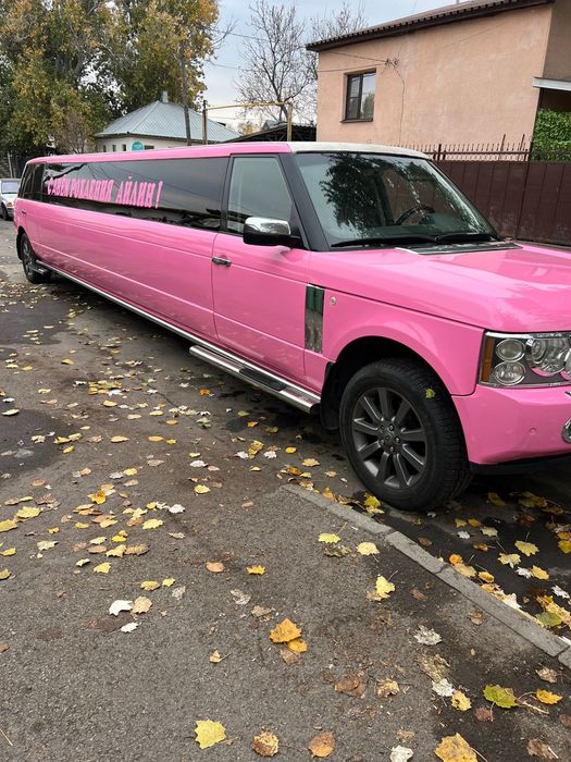 Розовый Cadillac escalade лимузин аренда прокат