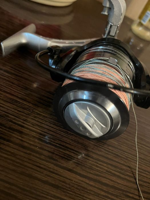 катушка новая с плетнекой в подарок