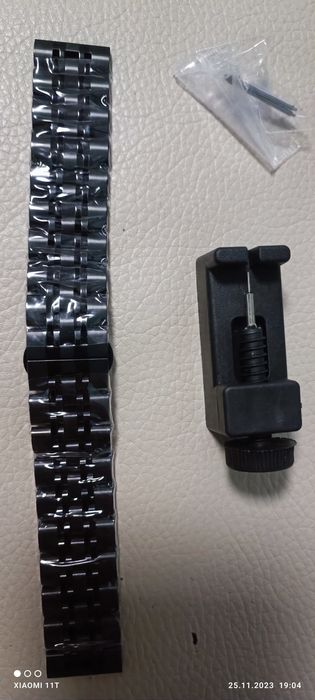 Curea metalică ceas