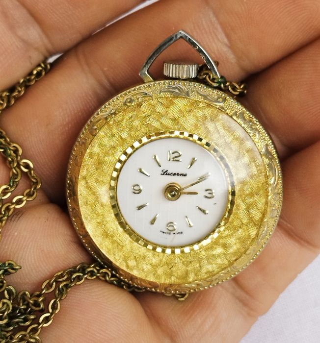 Ceas damă mecanic Lucerne, pandantiv cu lanț, un rubin, placat cu aur