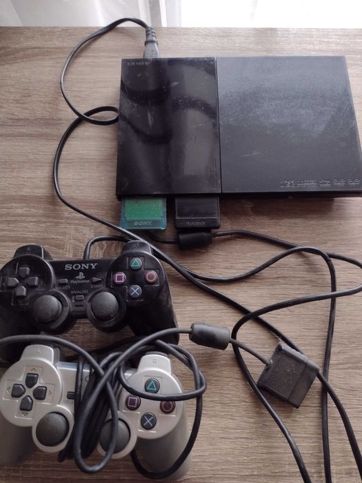 Комплект конзола PS2  с игри и аксесоари