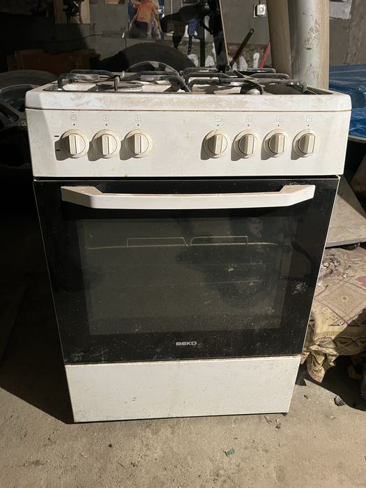 Продам газ плиту духовку