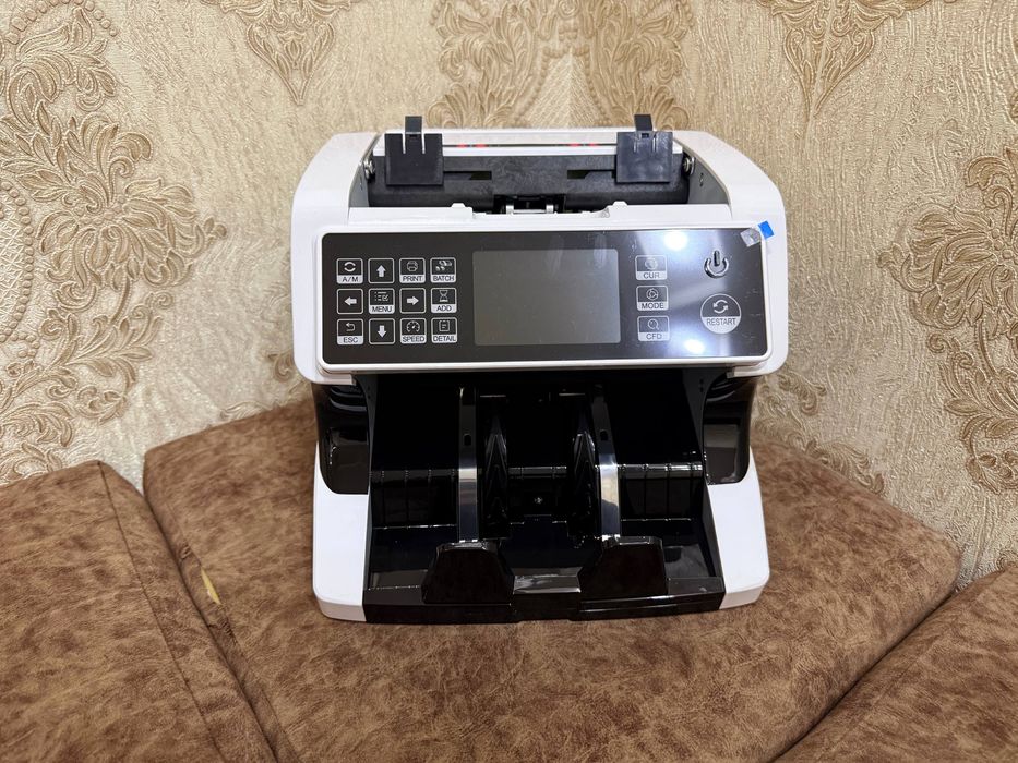 pul sanash va tekshirish aparati sum va dollarni tekshiradi