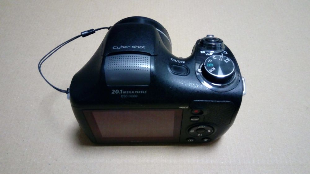 Спешно фотоапарат sony H300