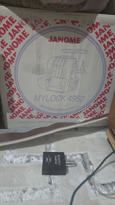 оверлок janome 4952