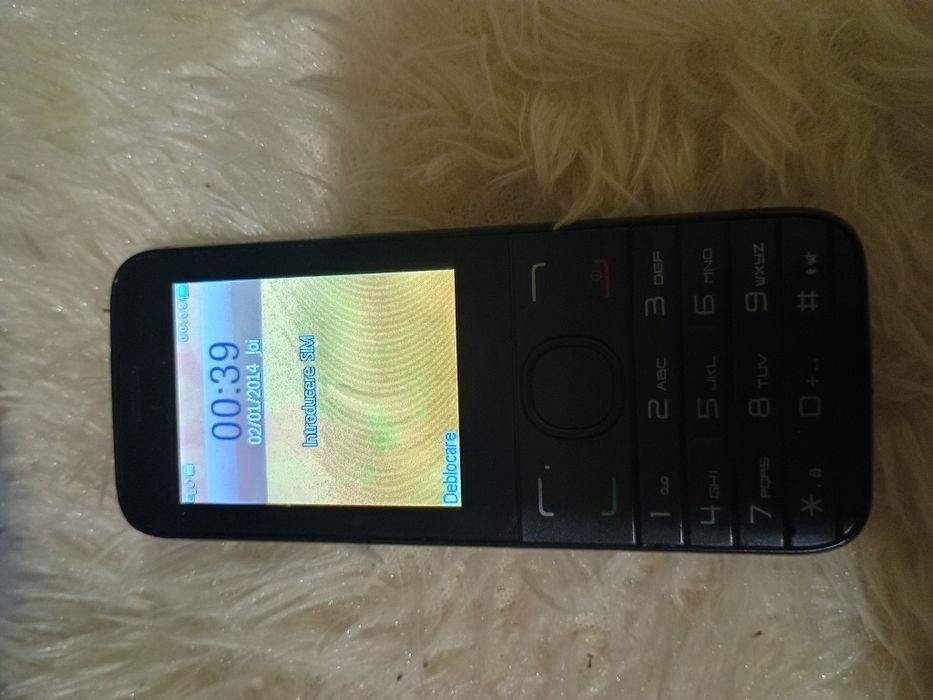 Vând telefon mobil cu butoane