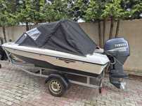 Barca  Glastron cu motor Yamaha 40-60 cp si peridoc
