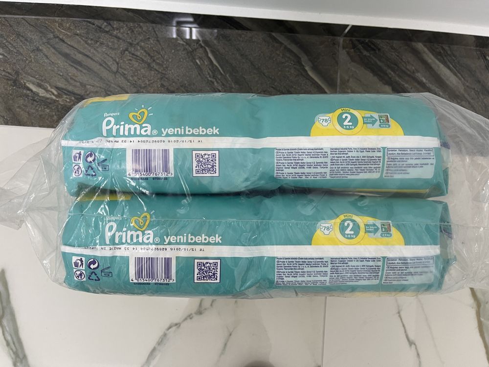 Pampers Prima 2 и еднократни подложки за смяна на пелени