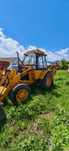 Buldoexcavatoare si masina de transport