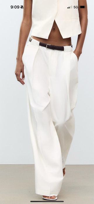 Pleated trousers with belt