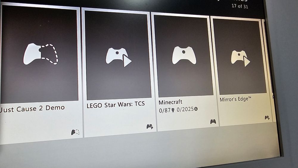 Xbox slim complet 1 maneta originala + 12 jocuri Minecraft