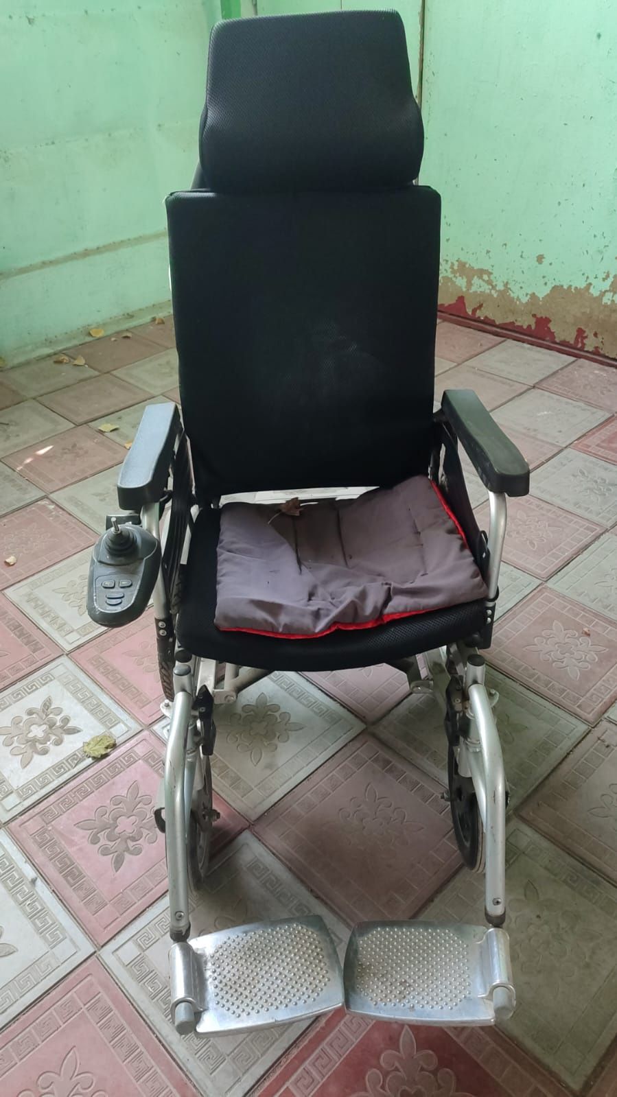Инвалидный коляска.