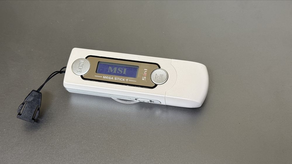 Stick muzica radio mp3 msi mega stick 128mb inregistrare colectie