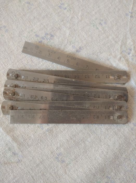 Метр складной металлический.