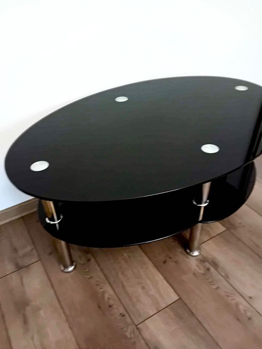 Măsuța de cafea din sticlă neagră