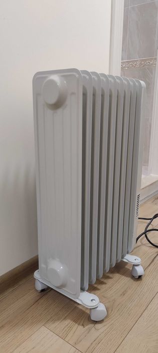 Продавам маслен радиатор с вентилатор  9 секции TESY CB 2009 E01 V