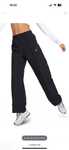 Nike. Everything wovens mid-rise open-hem pants