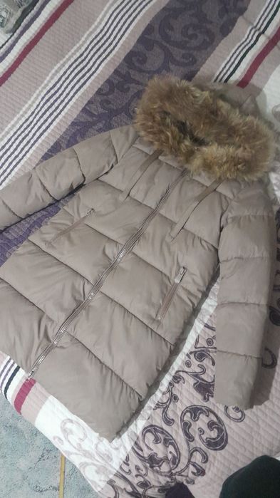 Пуховик зимний состояние отличное.