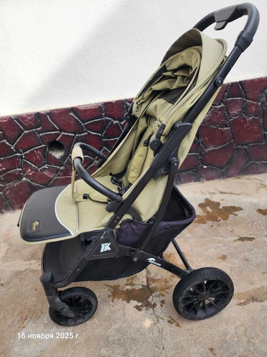 Teknum.  Детская прогулочная коляска.