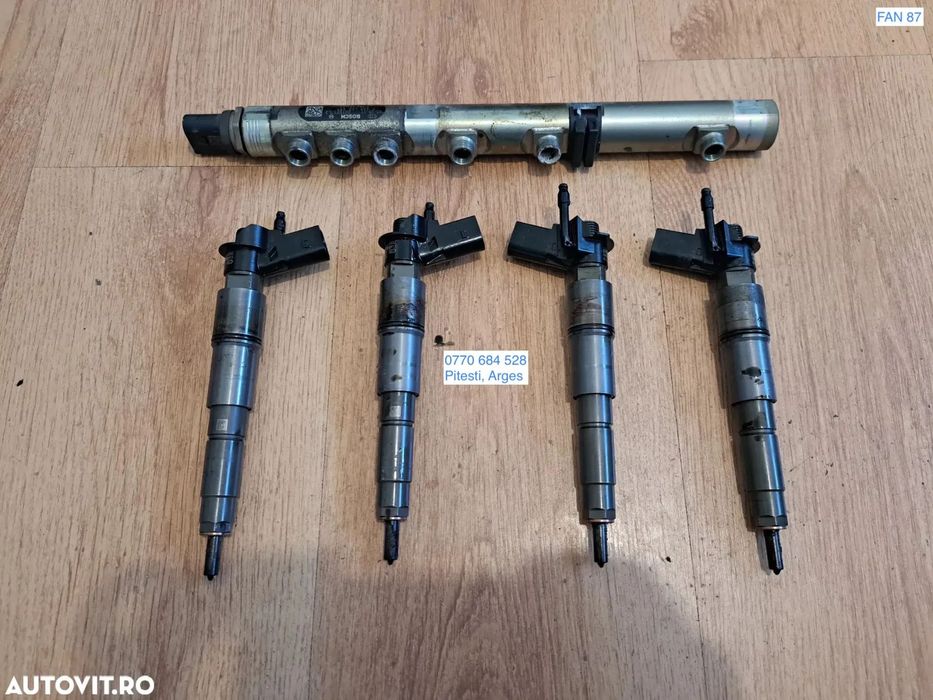 Injector injectoare Rampa injectoarea originale Bmw Seria 7 E65 745d