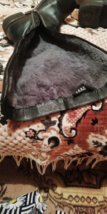 Женские зимние сапоги из натуральной кожи и натурального меха.