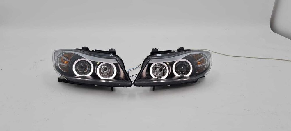 9. Faruri BMW Seria 3 E90 E91 (2005-2008) Angel Eyes Garantie 12luni