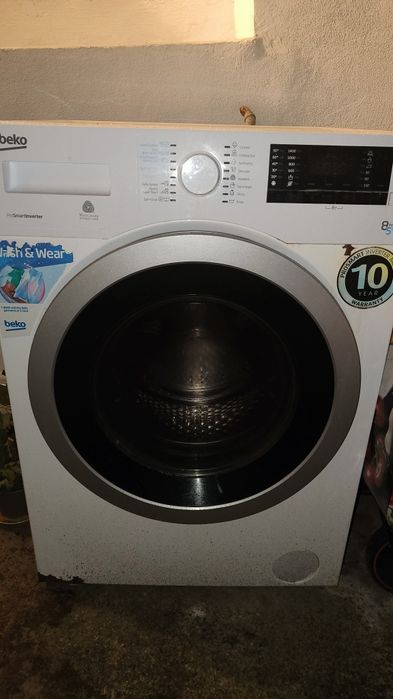 Masina de spalat rufe cu uscator Beko HTV8733XS0,display-ul  cu eroare