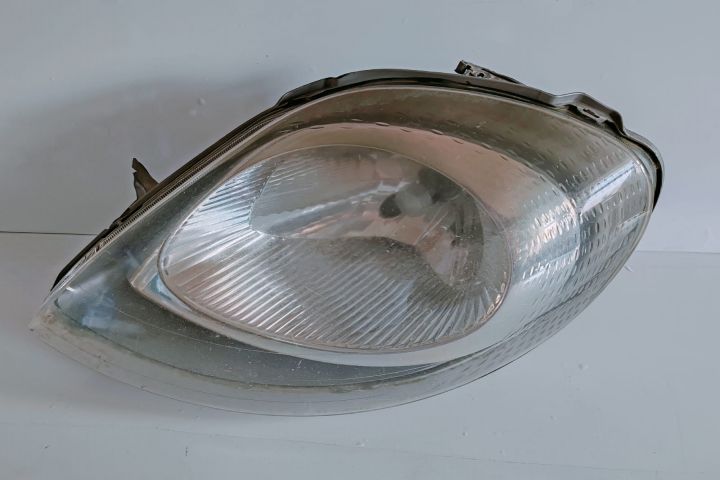 Far stanga  7700311371 Nissan Primastar prima generatie seria