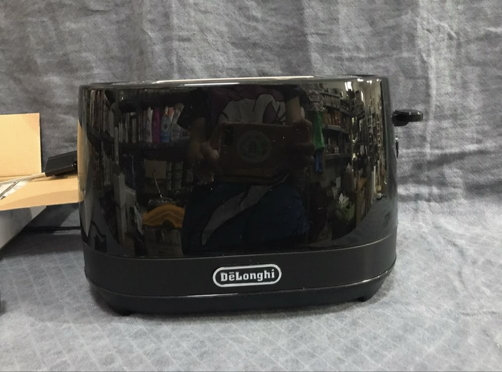 Тостер Delonghi