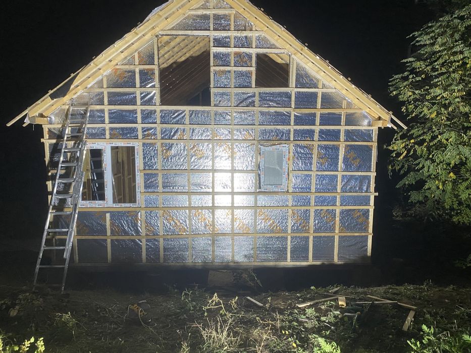 Construcții case din lemn.