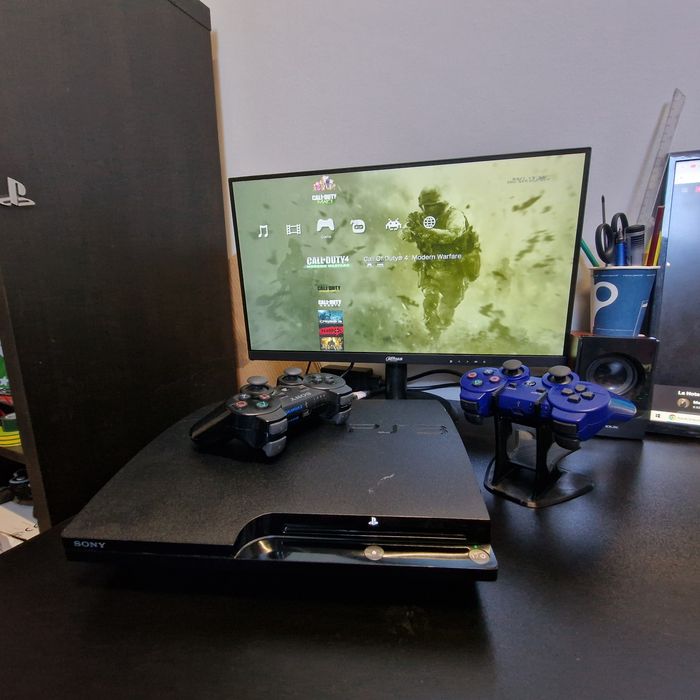 Playstation 3 slim modat Hdd 500gb 2 manete PS3 50 jocuri