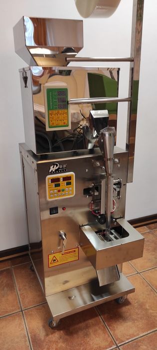 Masina automata de cantarit si impachetat produse granulare