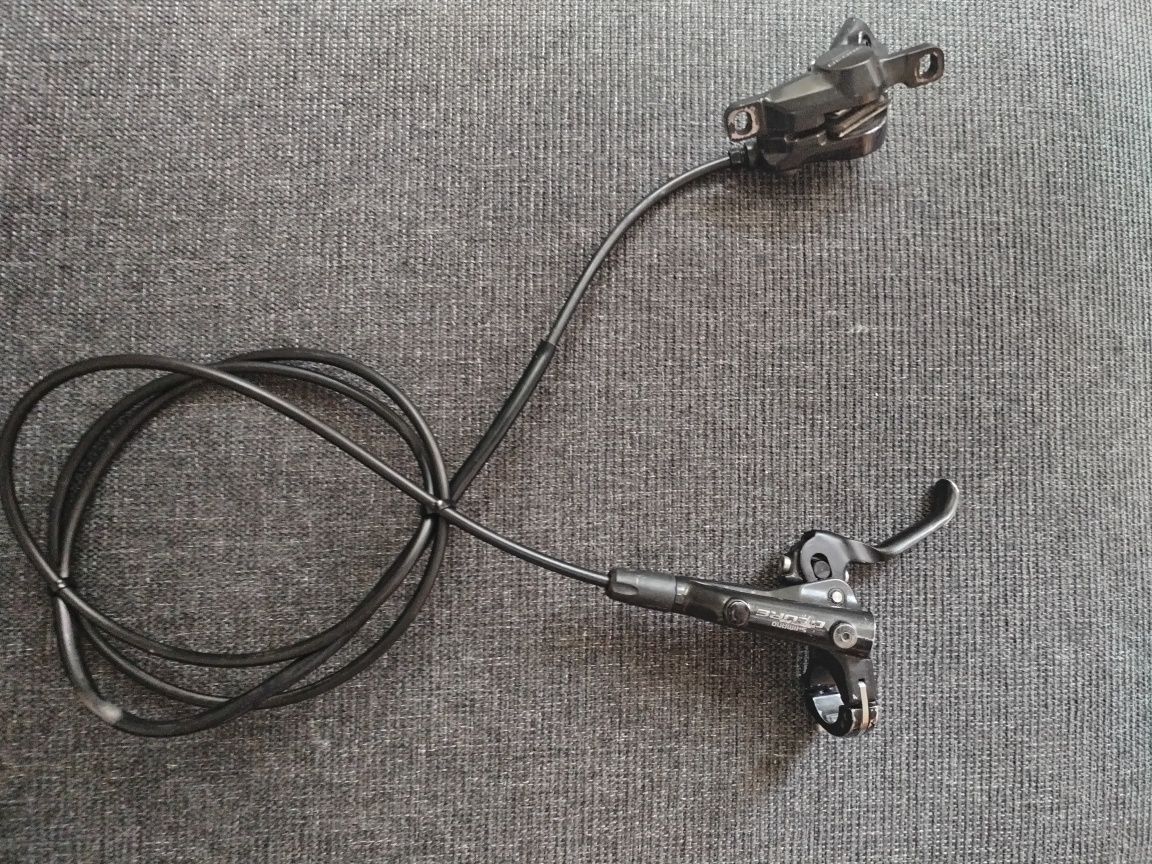 Set frane SHIMANO DEORE ( 4 pistoane și 2 pistoane )