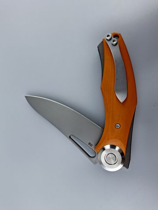 Briceag Bear Dark cu lama otel D2 și mâner portocaliu G10