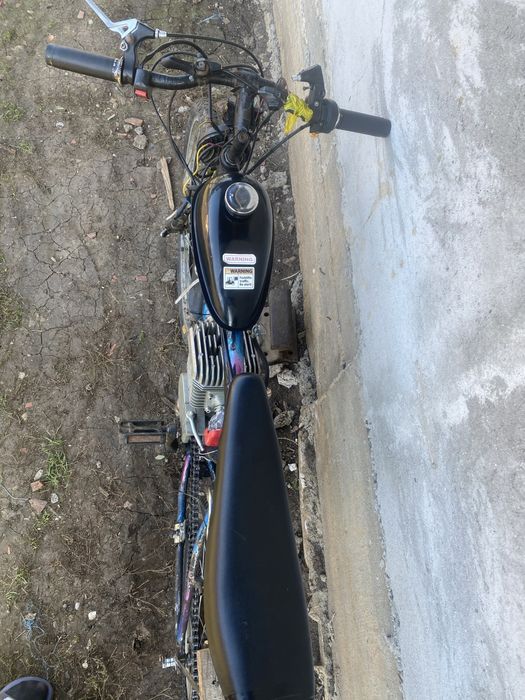 Bicicleta cu motor 100cc