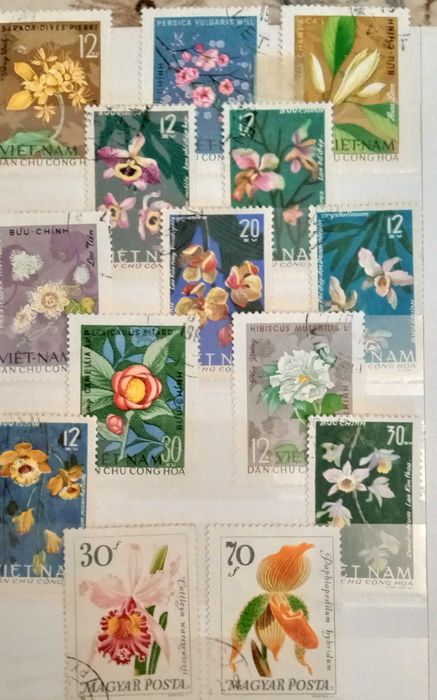 Альбом с марками-флора и фауна экзотич. стран:птицы,цветы,рыбы,грибы