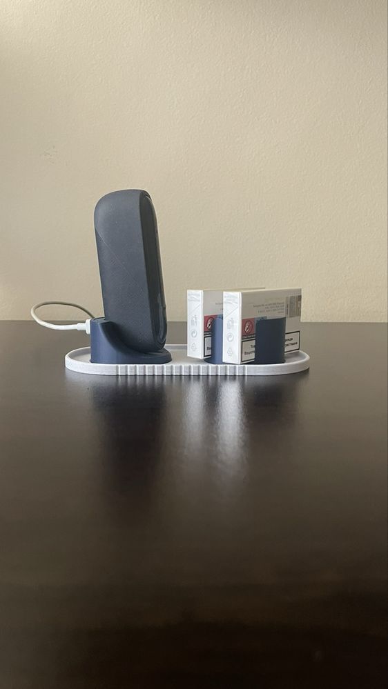 Контейнер за стикове IQOS и зарядна станция