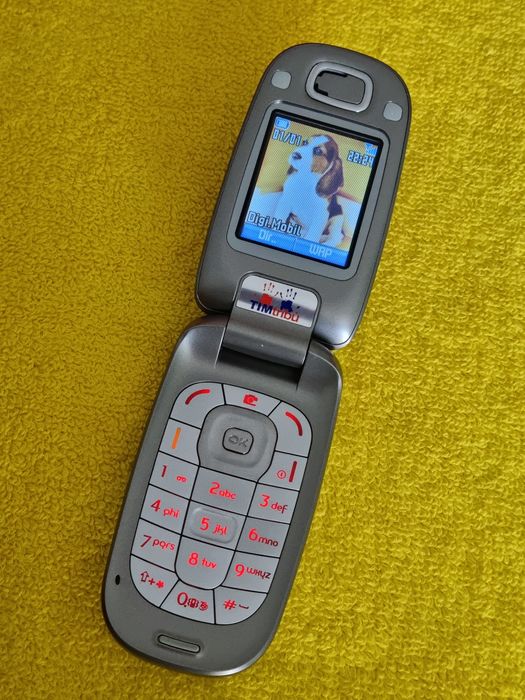Telefon Alcatel cu clapeta cu incarcator