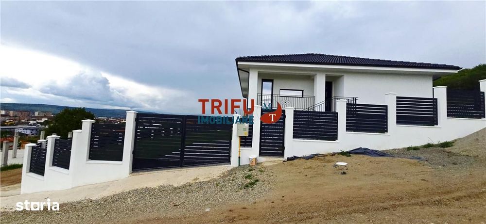 Casa cu garaj 3 dormitoare birou 600mp teren