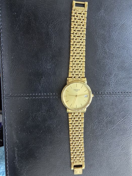 Tissot gold T870/970