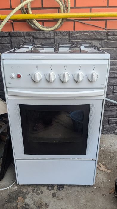 Газовая плита  с духовкой