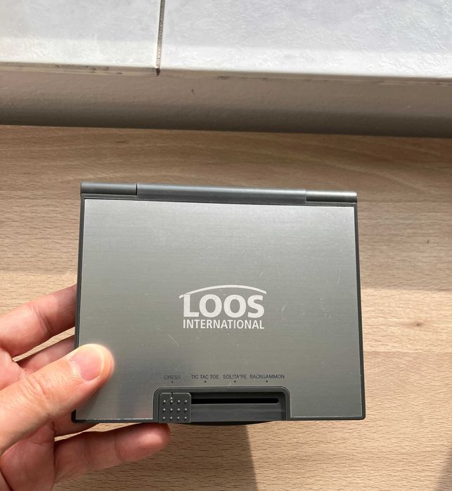 Joc de societate portabil 4 in 1 - Șah, X și Zero, Solitaire, Table